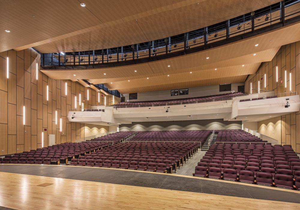 Interior image of Johnston High's performing arts center's auditorium seating in Johnston Iowa