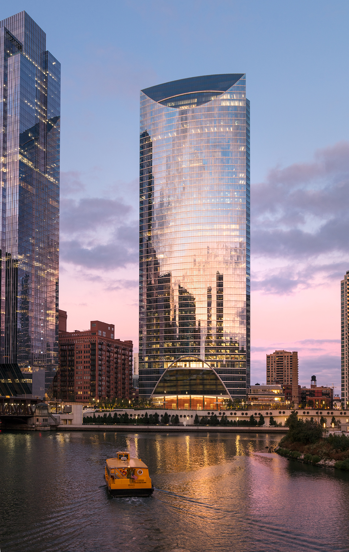 Exterior view of River Point Tower at sunset