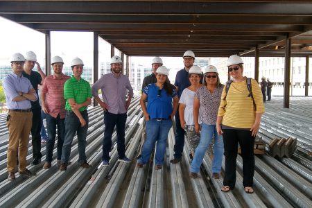 Alvine Engineering staff pose at the 1201 Cass construction site.